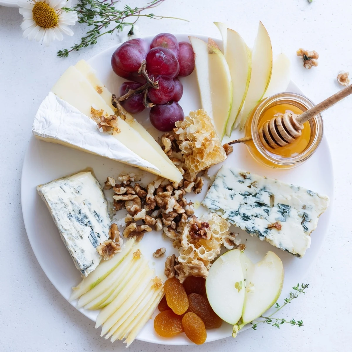 Creamy Brie, blue cheese, and honeycomb create the foundation of this inviting Honey & Cheese Board.