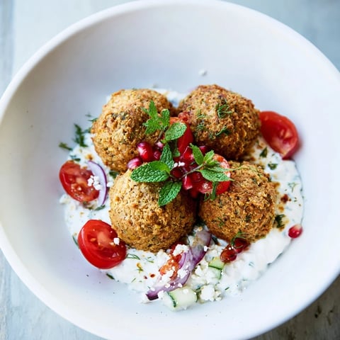 Crispy festive falafel wrapped in tortillas, forming a beautiful Christmas wreath, ready to eat.