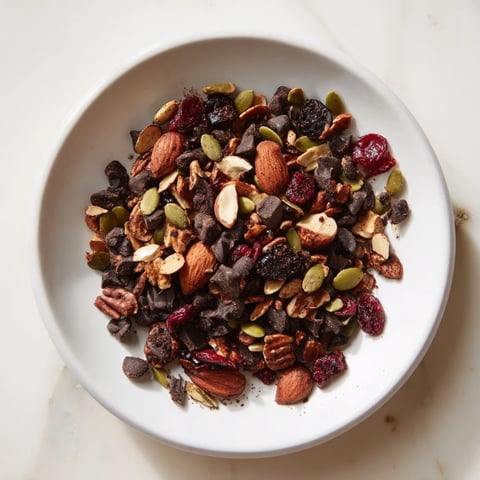 Golden roasted acorn and oak snack mix, a flavorful vegetarian treat with nutty aromas.