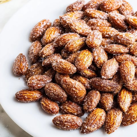 Golden and crunchy cinnamon roasted almonds, perfect as a sweet and savory snack anytime.