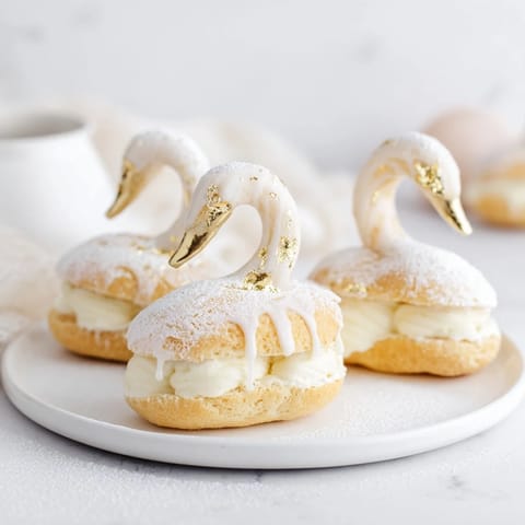 These French Elegant Swan Petit Fours are ready to serve, a truly decadent dessert experience.