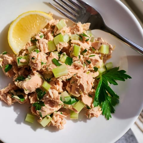 This easy Spicy Zesty Tuna Salad features creamy dressing with chopped scallions, perfect for a quick protein-packed lunch sandwich.