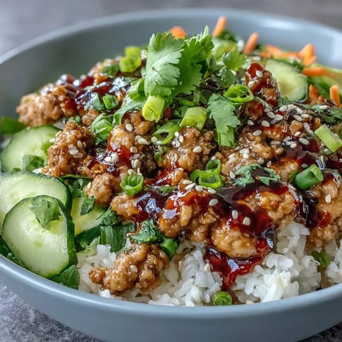 Bang Bang Ground Turkey Rice Bowls with creamy sauce, fluffy rice, and crunchy vegetables.